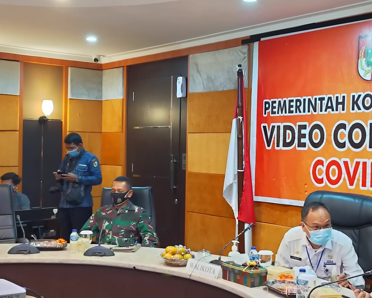 Dandim 0301/PBR Mengikuti Rakor Sinergitas Bersama Forkopimda Pekanbaru Secara Virtual