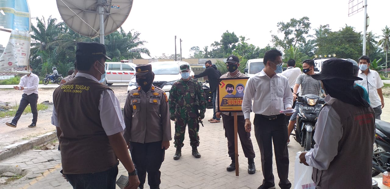 Dalam Program Kerja 100 Hari Kapolri, Kapolsek Bukit Kapur Polres Dumai Ciptakan Gerakan Bukit Kapur Bermasker (BUKKER)