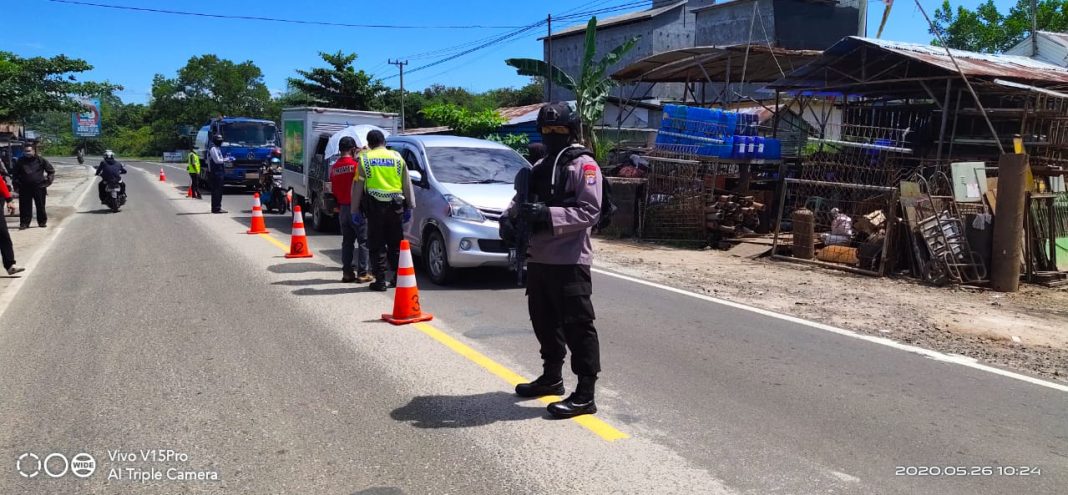 Pelaksanaan PSKH di Kota Palangka Raya, Personil Satuan Brimob Polda Kalteng Ikut Serta Dalam Melaksanakan Kegiatan Penjagaan Pos
