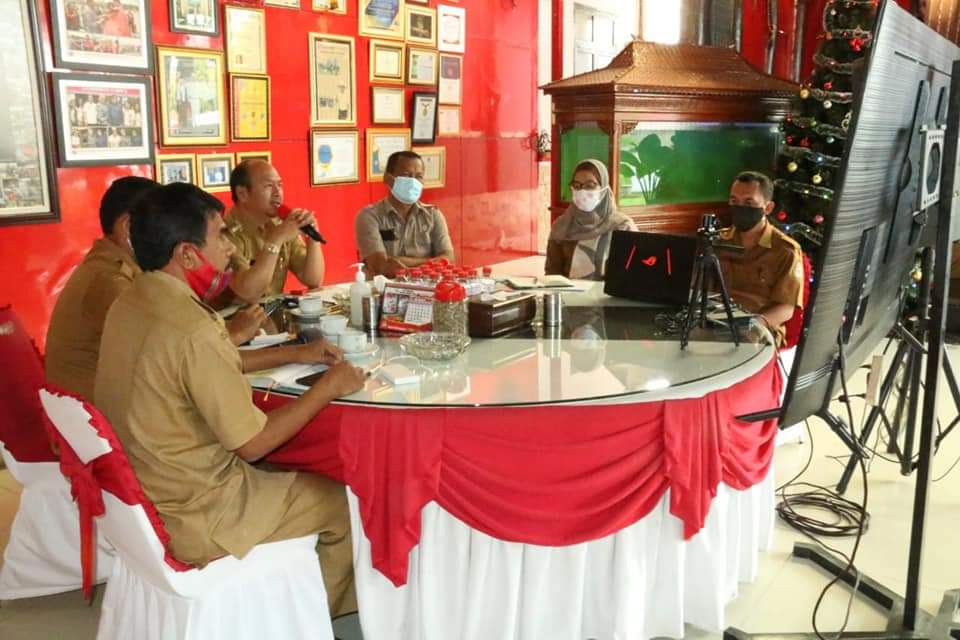 Bupati Taput Rakor Tentang Laporan Akhir Sucofindo Mengenai Analisis Ekonomi Berdirinya Untara Melalui Zoom Meeting