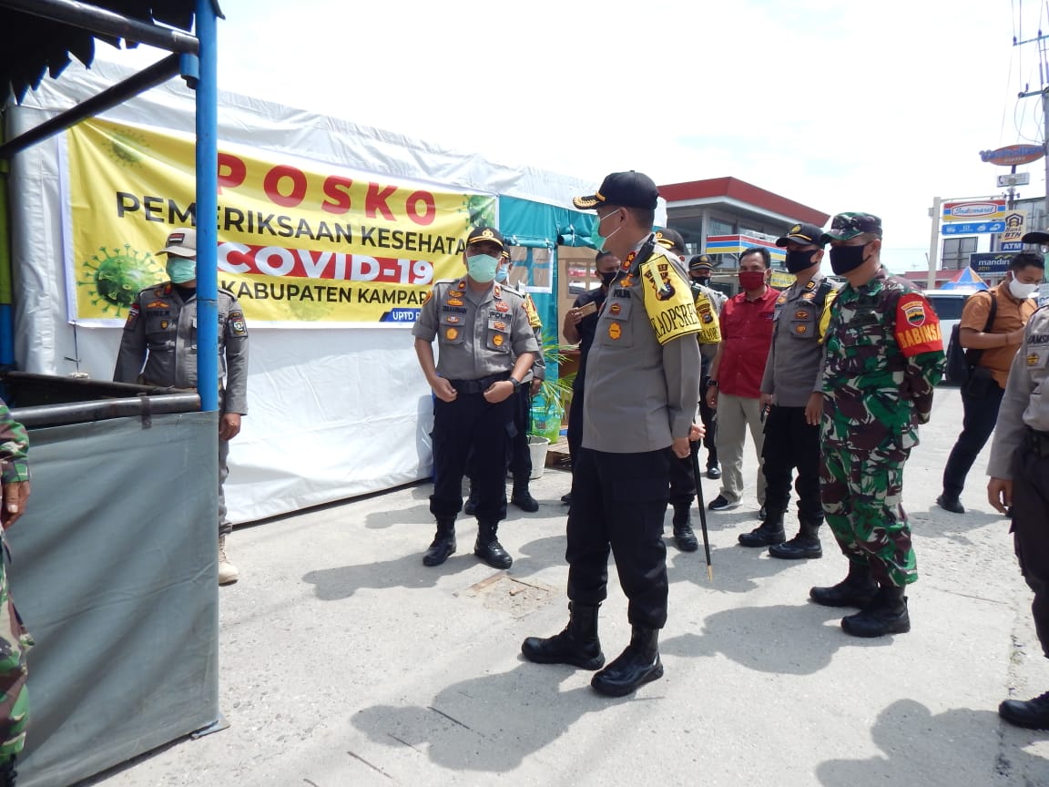 Kapolres Kampar Meninjau Pelaksanaan Pos Check Point Penanggulangan Covid-19
