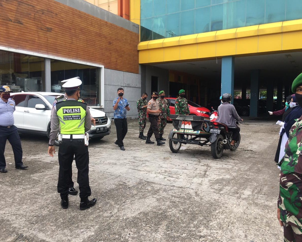 Tim Gabungan di Kabupaten Kampar Lakukan Pendisiplinan Masyarakat Untuk Patuhi Protokol Kesehatan