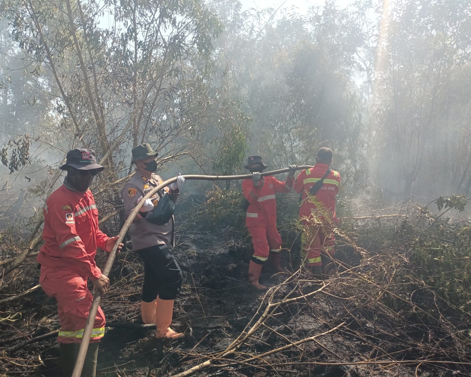 Polres Dumai Gencarkan Pemadaman dan Pendinginan Karhutla, Kapolres Tegaskan Larangan Pembukaan Lahan Dengan Cara Membakar
