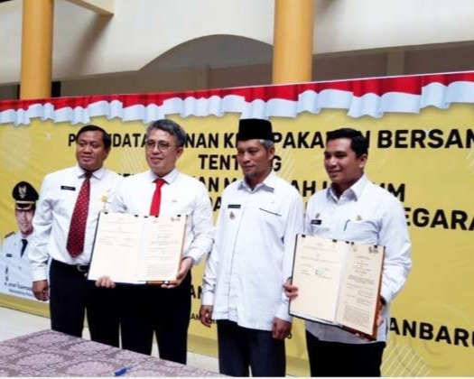 Bapenda Kota dan Kejari Pekanbaru Melaksanakan Penandatangan Perjanjian Kerjasama Di Bidang Bantuan Hukum