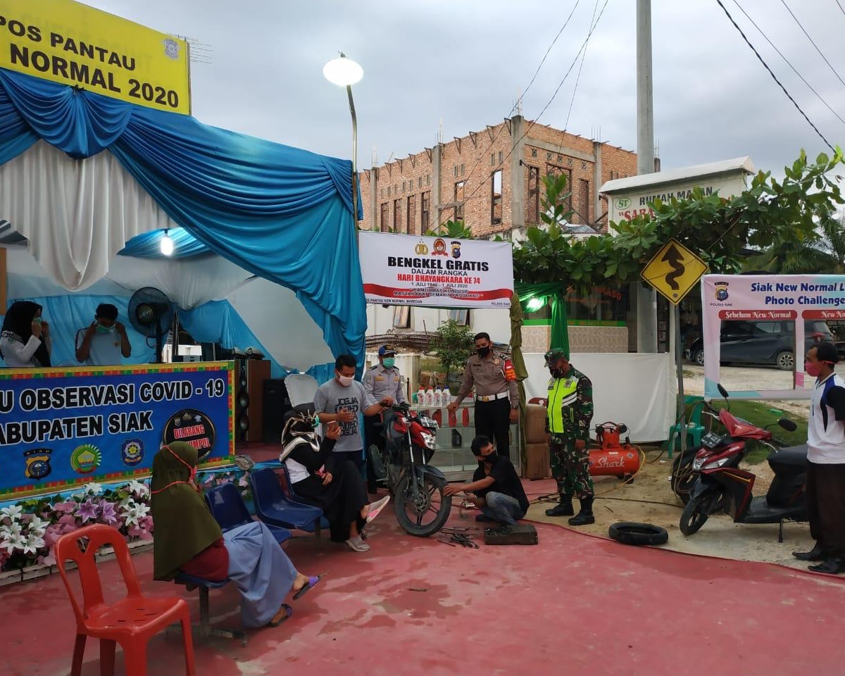Meriahkan Hari Bhayangkara ke 74, Polres Siak Mengadakan Bengkel Gratis di Pos Pantau New Normal Kampung Tengah Maredan