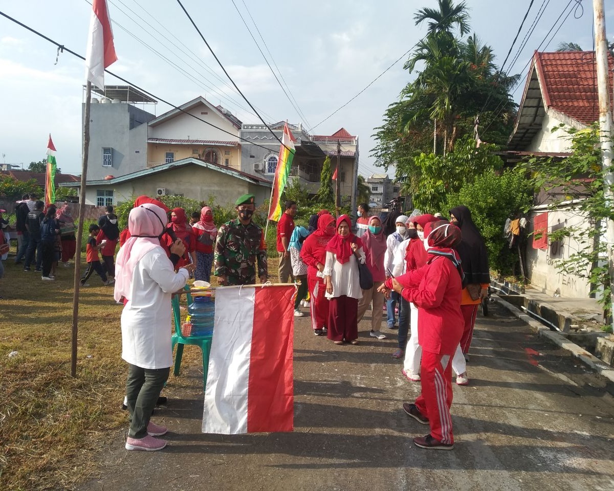 Dalam Rangka HUT RI Ke-75, Kodim 0301/PBR Olahraga Bersama dan Pembagian Sembako