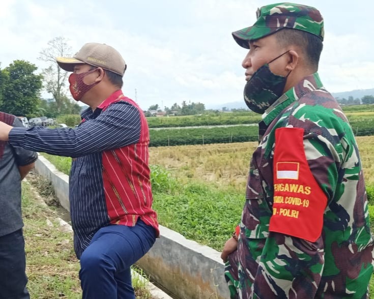 Bupati Taput Hadiri Peletakan Batu Pertama Jembatan Gantung Desa Parbubu Pea Karya Bakti TNI Kodim 0210/TU Tahun 2020